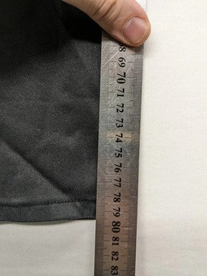 Damen grey coated skinny jeans with five-pocket design and gold hardware details.
