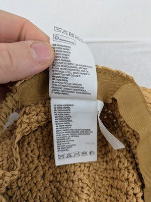 H&M beige cap woven straw look with elastic back and classic baseball design.