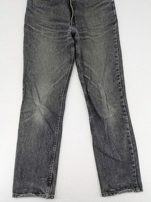 Levi's straight jeans faded black grey denim with iconic orange tab and five-pocket design.