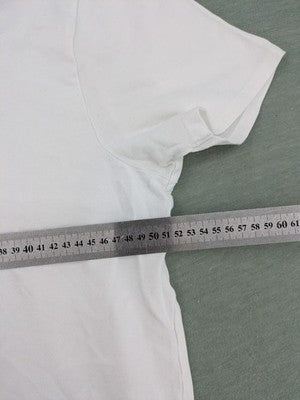 Darling Harbour white polo shirt with collar and three-button placket.