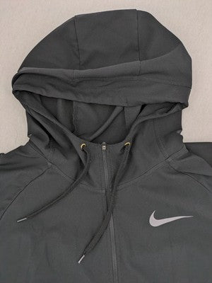 Nike Pro grey hoodie with Dri-FIT technology, full zip, and subtle swoosh logo.