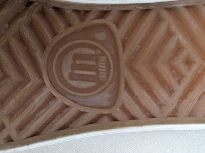 Mtng high top sneakers purple canvas with black laces and patterned white lining.