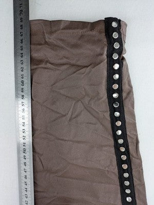 TREDY brown pants with black side stripes, silver studs, and adjustable drawstring.