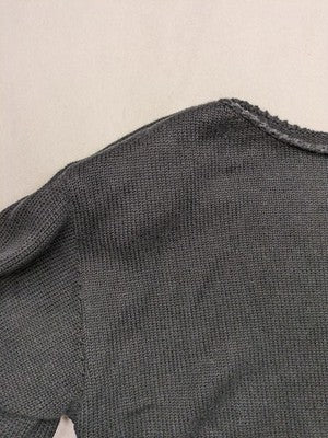 Anita black knit jumper with 3/4 sleeves, silver rhinestone accents and fringe hem.