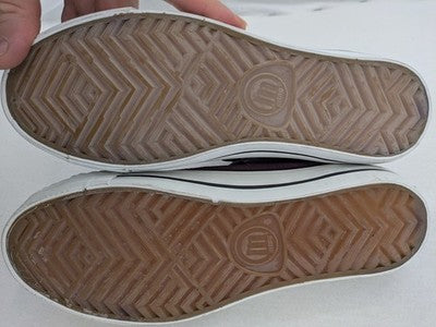 Mtng high top sneakers purple canvas with black laces and patterned white lining.