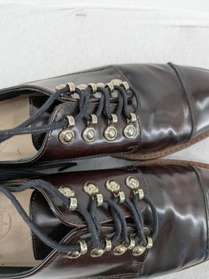Massimo Dutti brown deck shoes glossy leather cap toe with metallic eyelets and rugged sole.