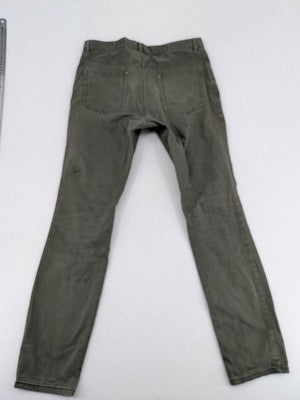 H&M khaki skinny fit jeans with classic five-pocket design and stretch cotton material.