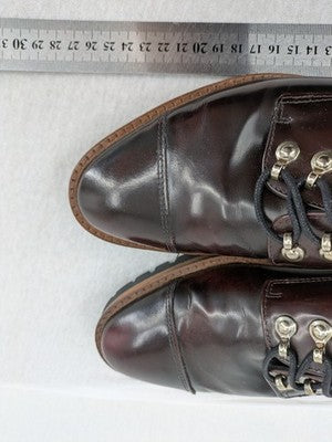 Massimo Dutti brown deck shoes glossy leather cap toe with metallic eyelets and rugged sole.