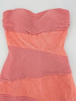 Laona pink bodycon cocktail dress with strapless design and floral lace details.