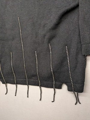 Anita black knit jumper with 3/4 sleeves, silver rhinestone accents and fringe hem.