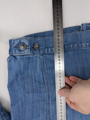 Select blue denim jacket with button closure and chest pockets, washed look.