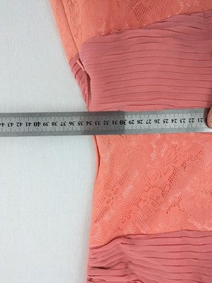 Laona pink bodycon cocktail dress with strapless design and floral lace details.