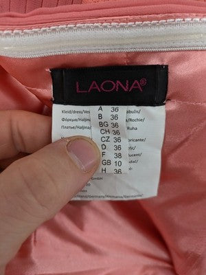 Laona pink bodycon cocktail dress with strapless design and floral lace details.