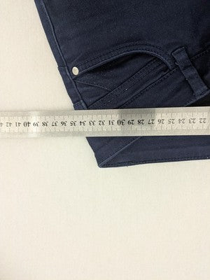 Up Fashion navy pants skinny fit 5-pocket design with ankle slit and stretch material.