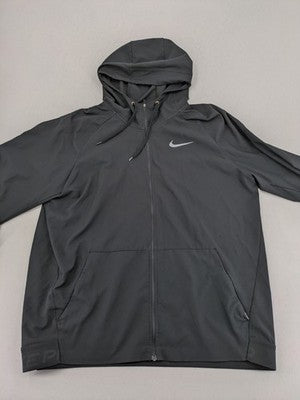 Nike Pro grey hoodie with Dri-FIT technology, full zip, and subtle swoosh logo.