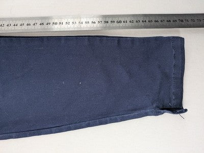 Up Fashion navy pants skinny fit 5-pocket design with ankle slit and stretch material.