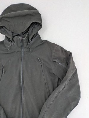 Condor grey softshell jacket with multiple pockets and adjustable hood, tactical outdoor design.