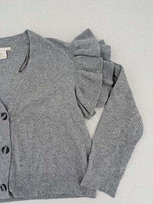 H&M grey cardigan with V-neck, button front, and layered ruffle sleeves.
