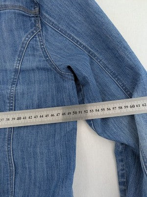 Select blue denim jacket with button closure and chest pockets, washed look.