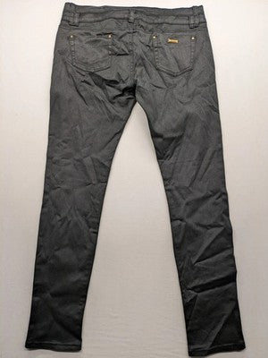 Damen grey coated skinny jeans with five-pocket design and gold hardware details.