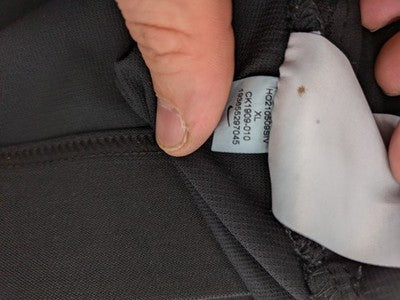 Nike Pro grey hoodie with Dri-FIT technology, full zip, and subtle swoosh logo.