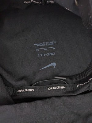 Nike Pro grey hoodie with Dri-FIT technology, full zip, and subtle swoosh logo.