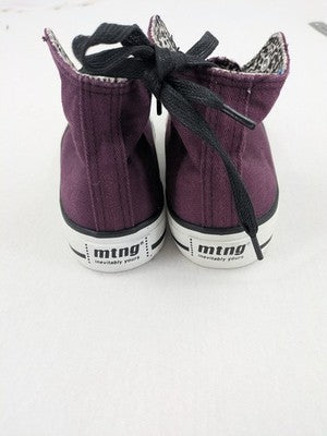 Mtng high top sneakers purple canvas with black laces and patterned white lining.