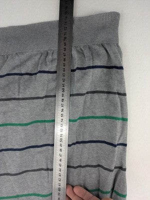 C. Comberti grey knit jumper with green and navy horizontal stripes, V-neck design.