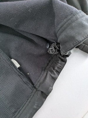 Condor grey softshell jacket with multiple pockets and adjustable hood, tactical outdoor design.