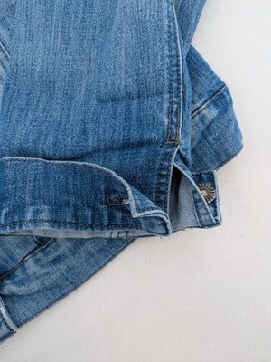 Select blue denim jacket with button closure and chest pockets, washed look.