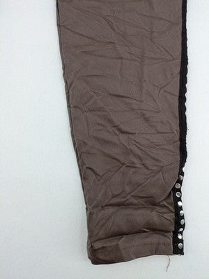 TREDY brown pants with black side stripes, silver studs, and adjustable drawstring.