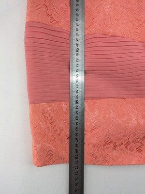 Laona pink bodycon cocktail dress with strapless design and floral lace details.