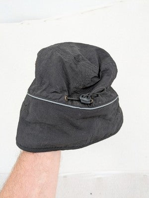 DHL green winter cap with reflective logo, ear flaps, and soft fleece lining.
