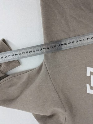 FB Sister beige zip-through hoodie with adorable teddy bear back print and kangaroo pocket.