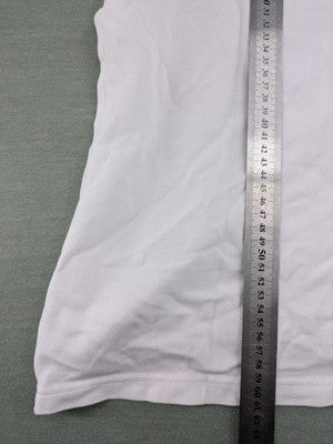 GANT white polo shirt with navy collar, embroidered logo on chest, piqué fabric.