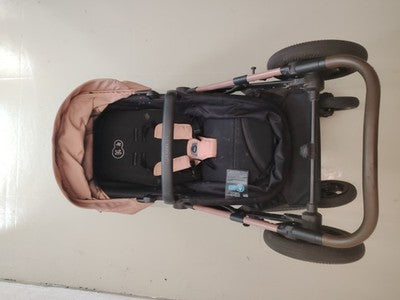Kinderkraft pink 2-in-1 baby stroller with large wheels and elegant design.