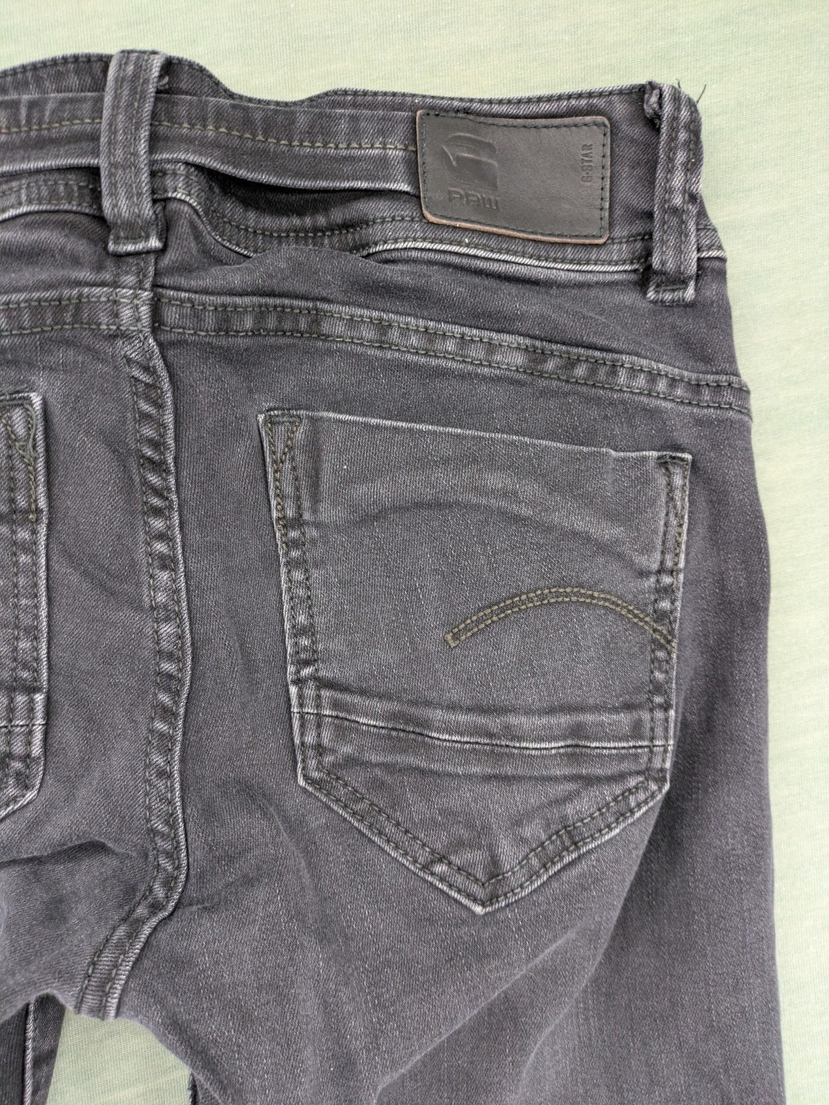 G-Star Raw grey straight jeans with 5-pocket design and logo detailing.