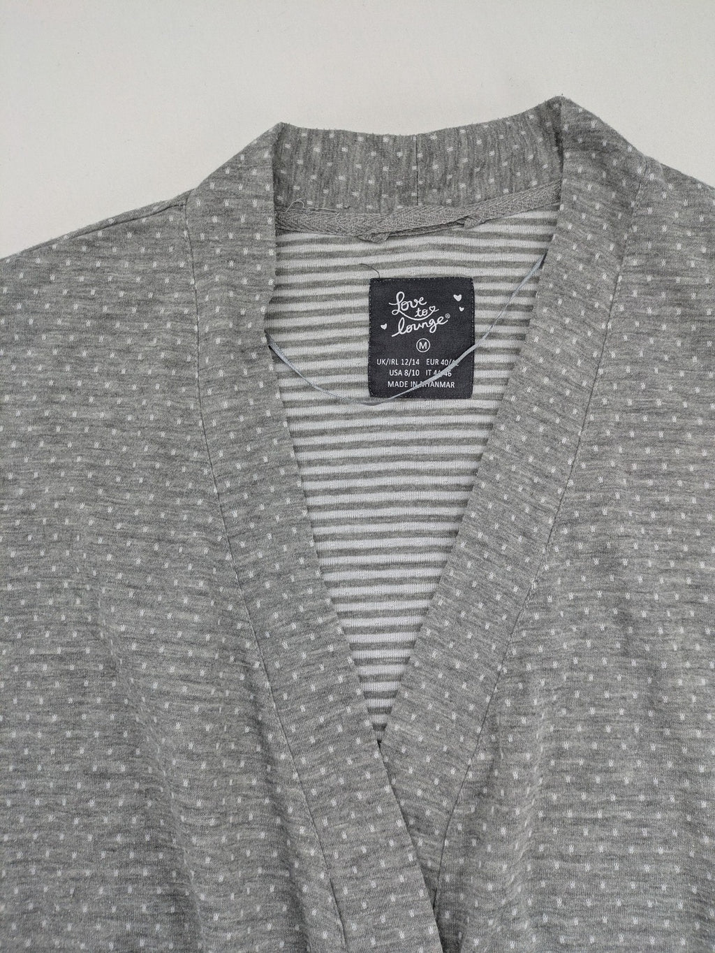Drizzle turtle neck jumper black grey with abstract graphic print and distressed details.