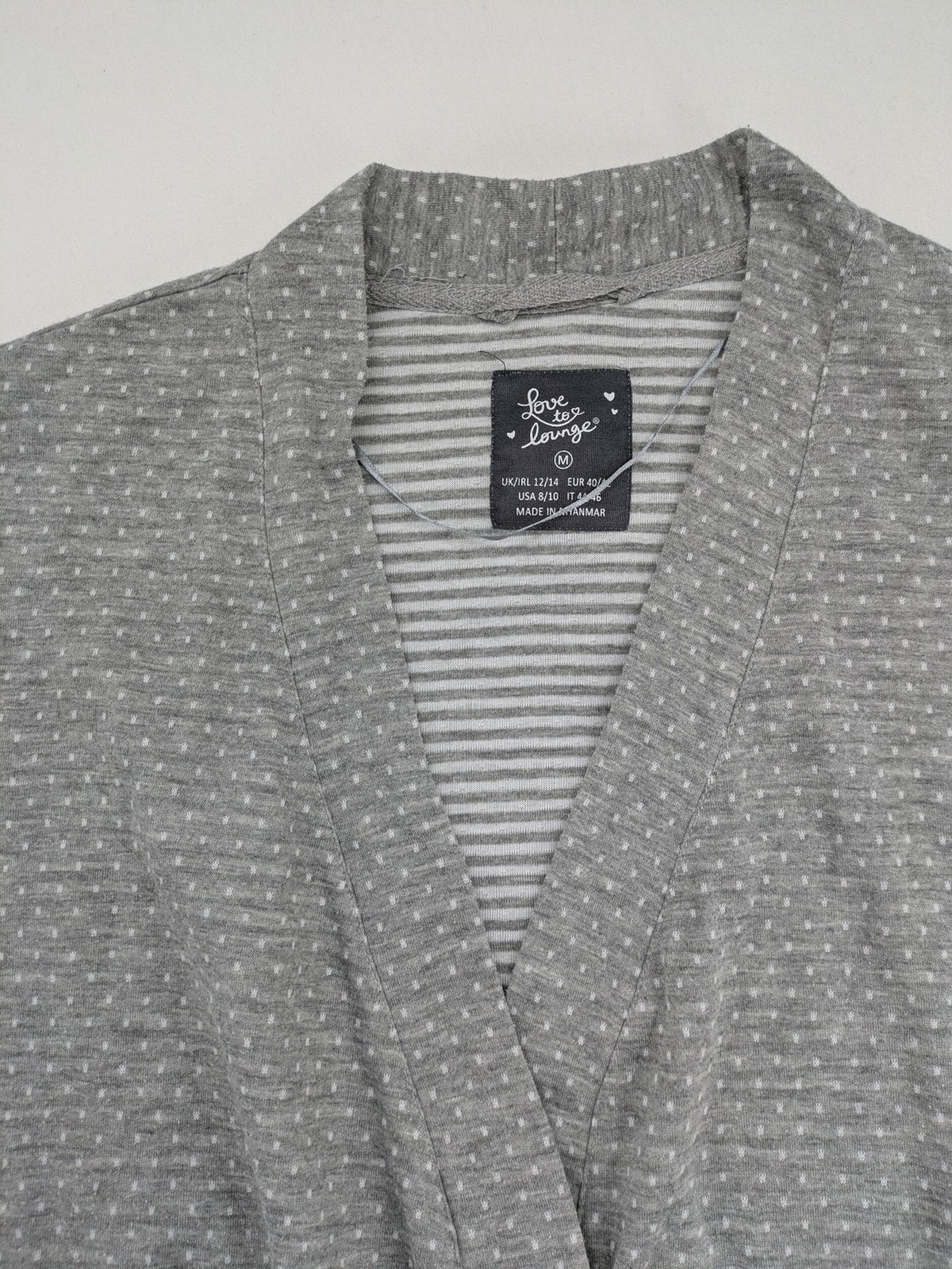 Drizzle turtle neck jumper black grey with abstract graphic print and distressed details.