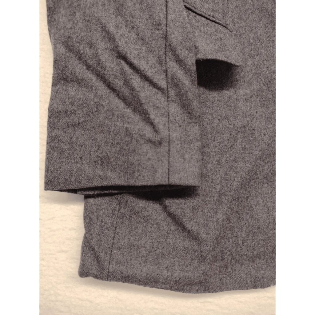 Adler pink two-piece suit, classic two-button design, luxurious wool-cashmere blend.