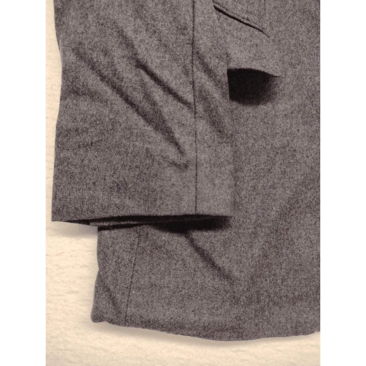 Adler pink two-piece suit, classic two-button design, luxurious wool-cashmere blend.