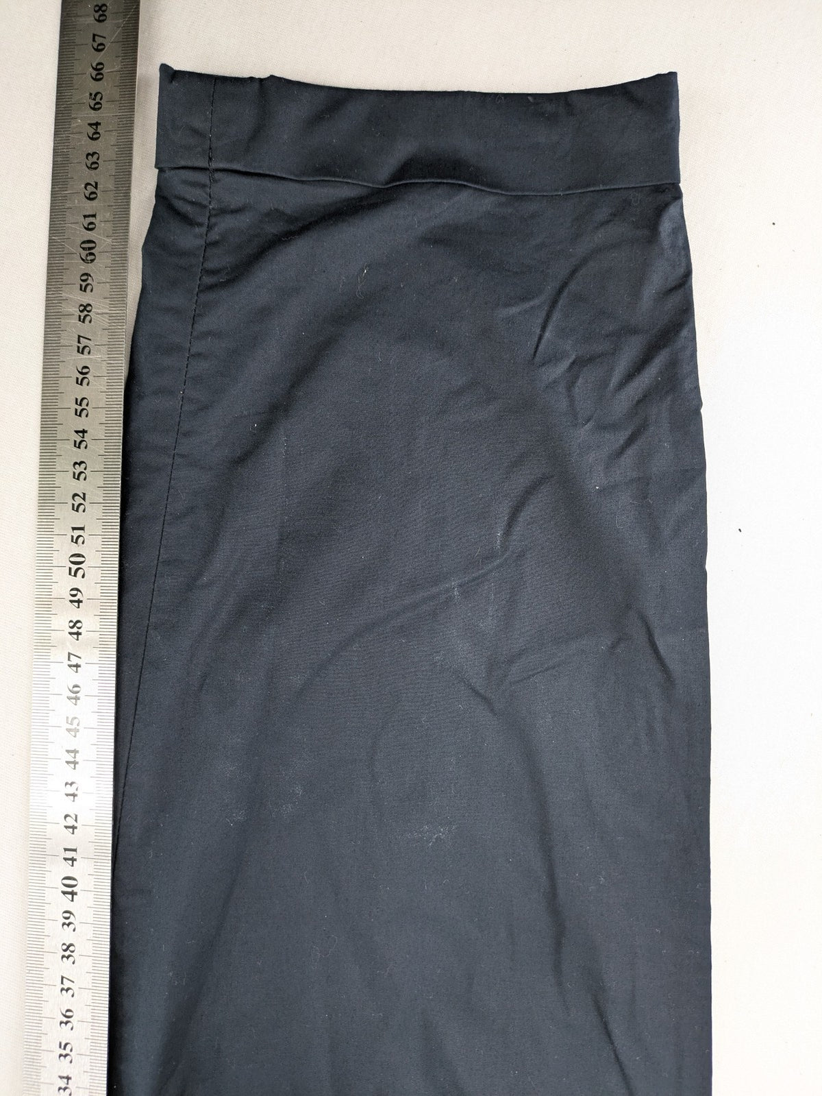 Mango Man black chinos flat front design with zipper and button closure.