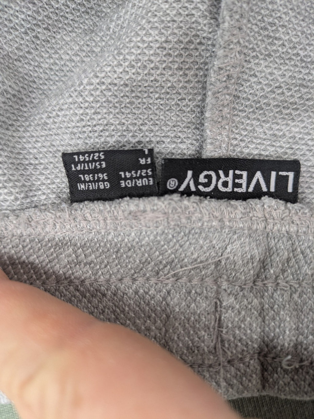 Livergy grey sweat shorts with elastic waistband, drawstring, and side pockets.