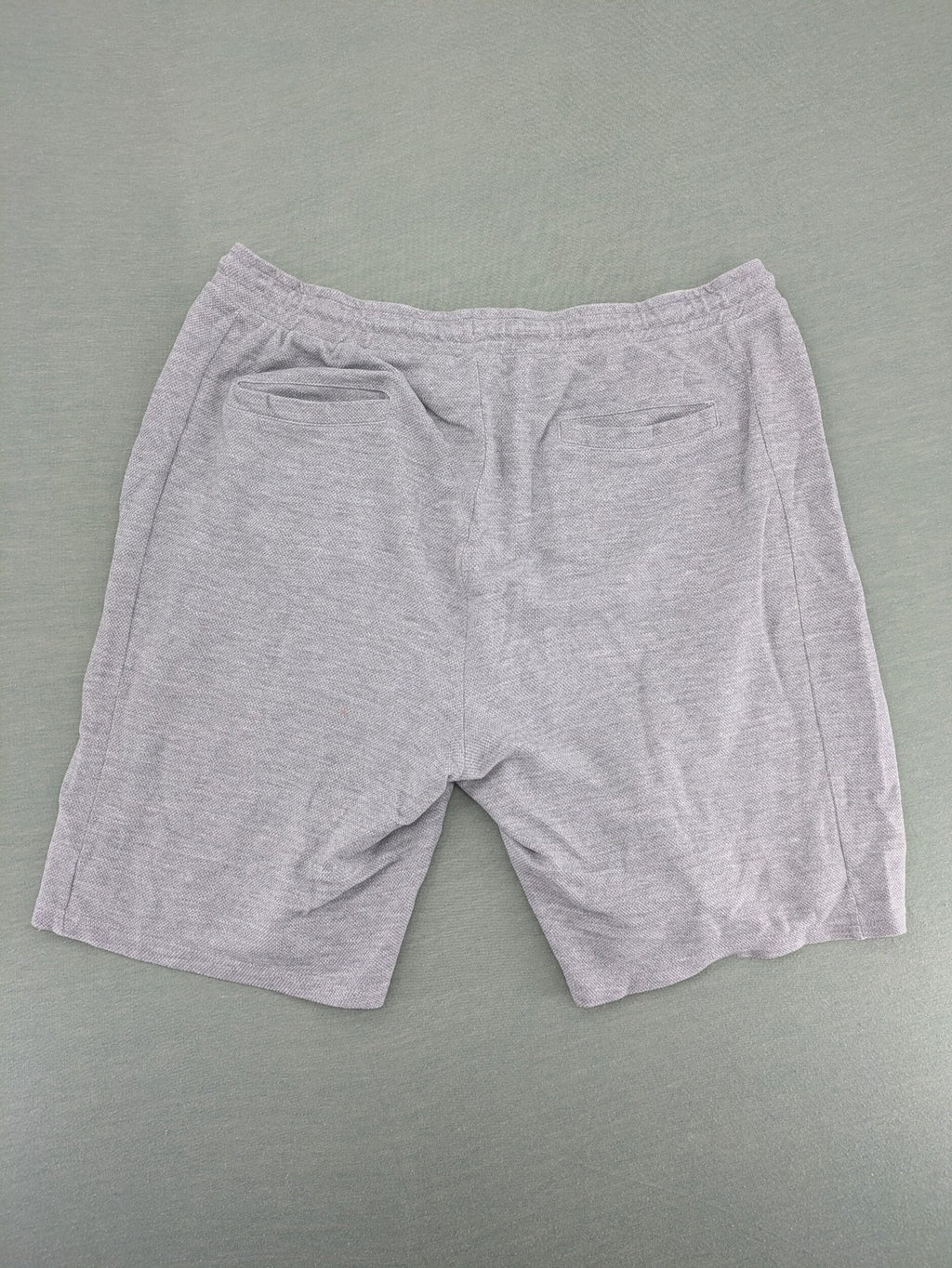 Livergy grey sweat shorts with elastic waistband, drawstring, and side pockets.