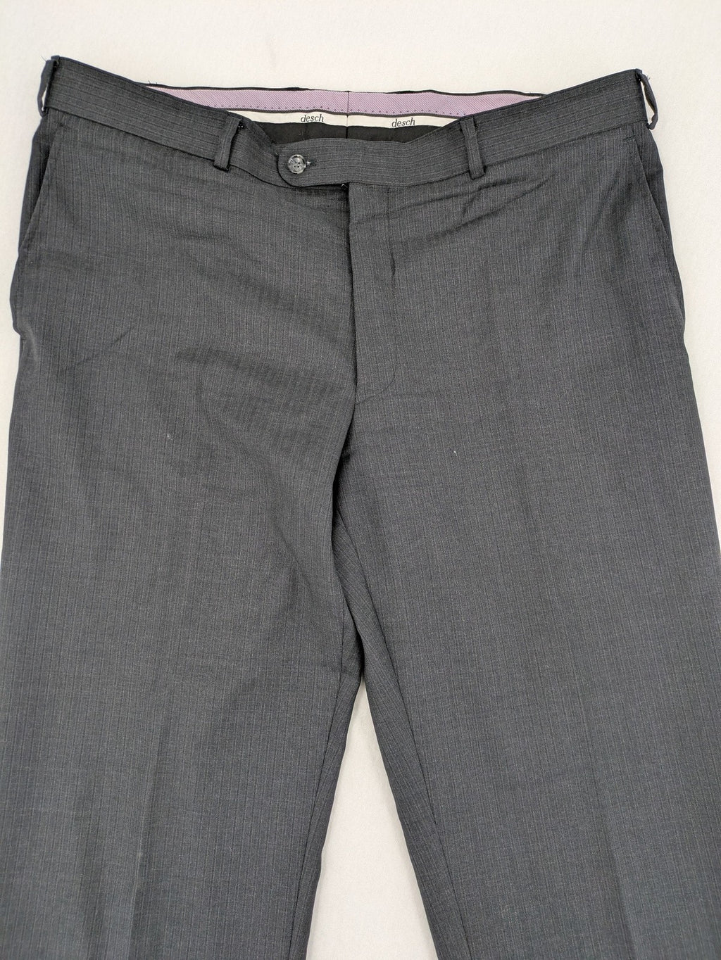 Desch grey suit pants with subtle pinstripe pattern and flat front design.