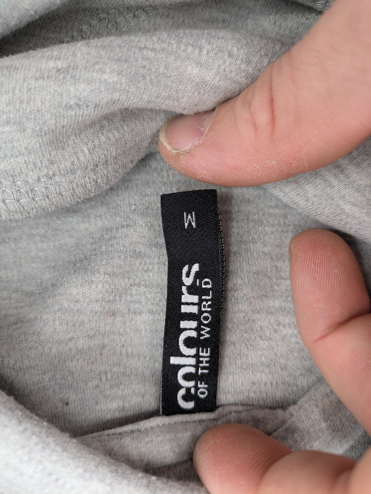 Colours Of The World grey knit jumper with pink drawstring, inspirational graphic print, soft material.