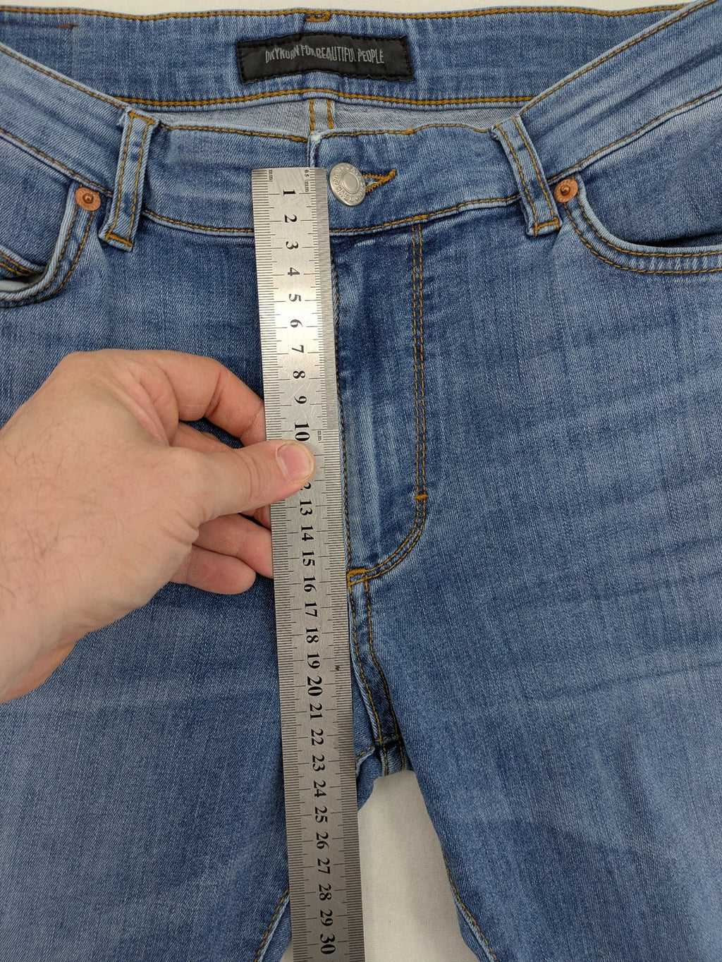 Drykorn blue straight jeans with stretch denim, classic fit, and logo patch on waistband.