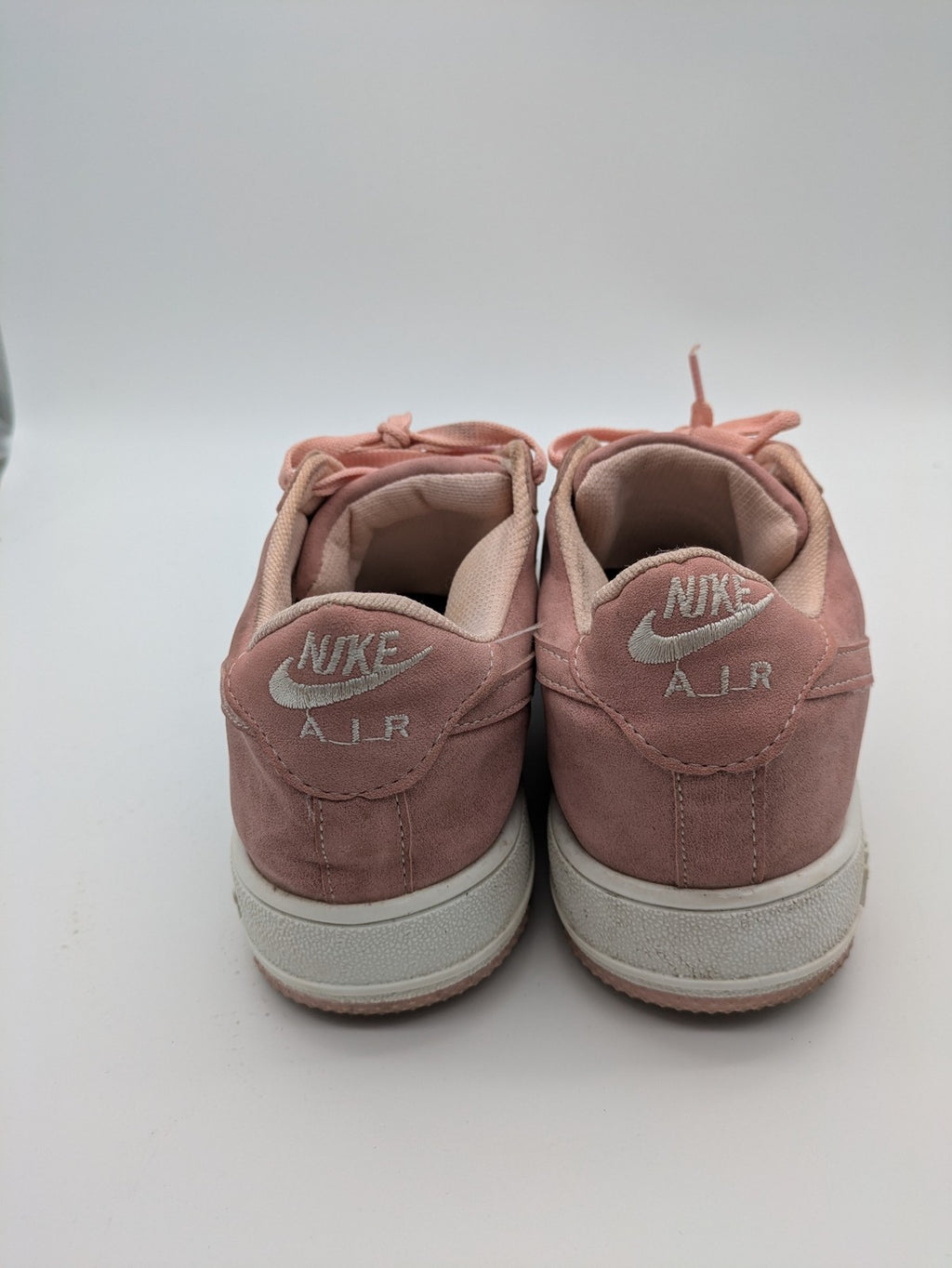 Nike Air Force 1 Low Top pink suede with perforated toe box and white sole