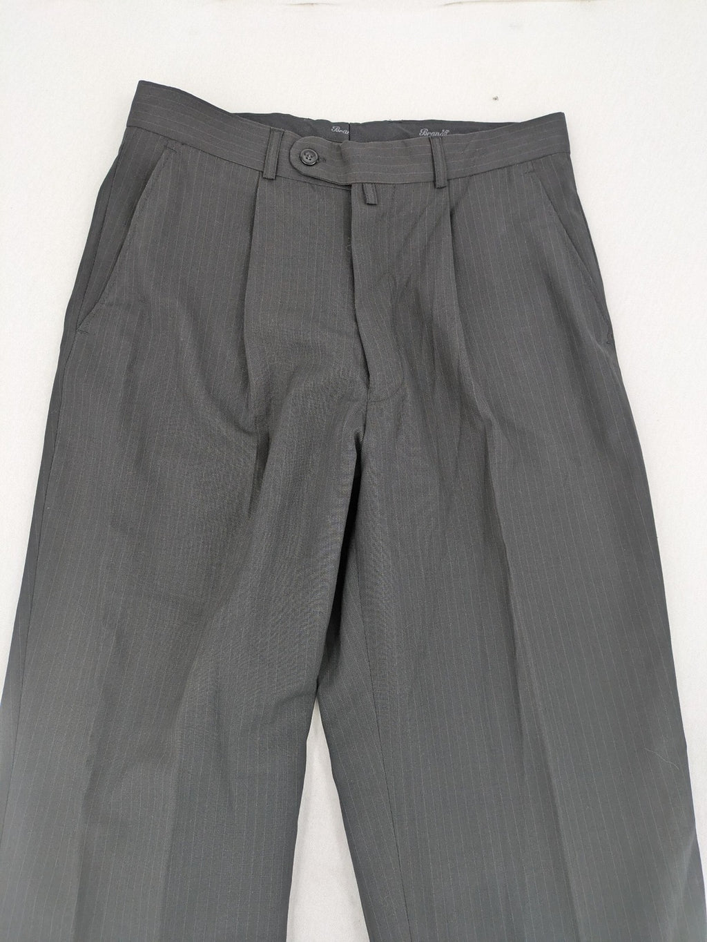 Wahl grey dress pants with pinstripe pattern and pleats, featuring side and back pockets.