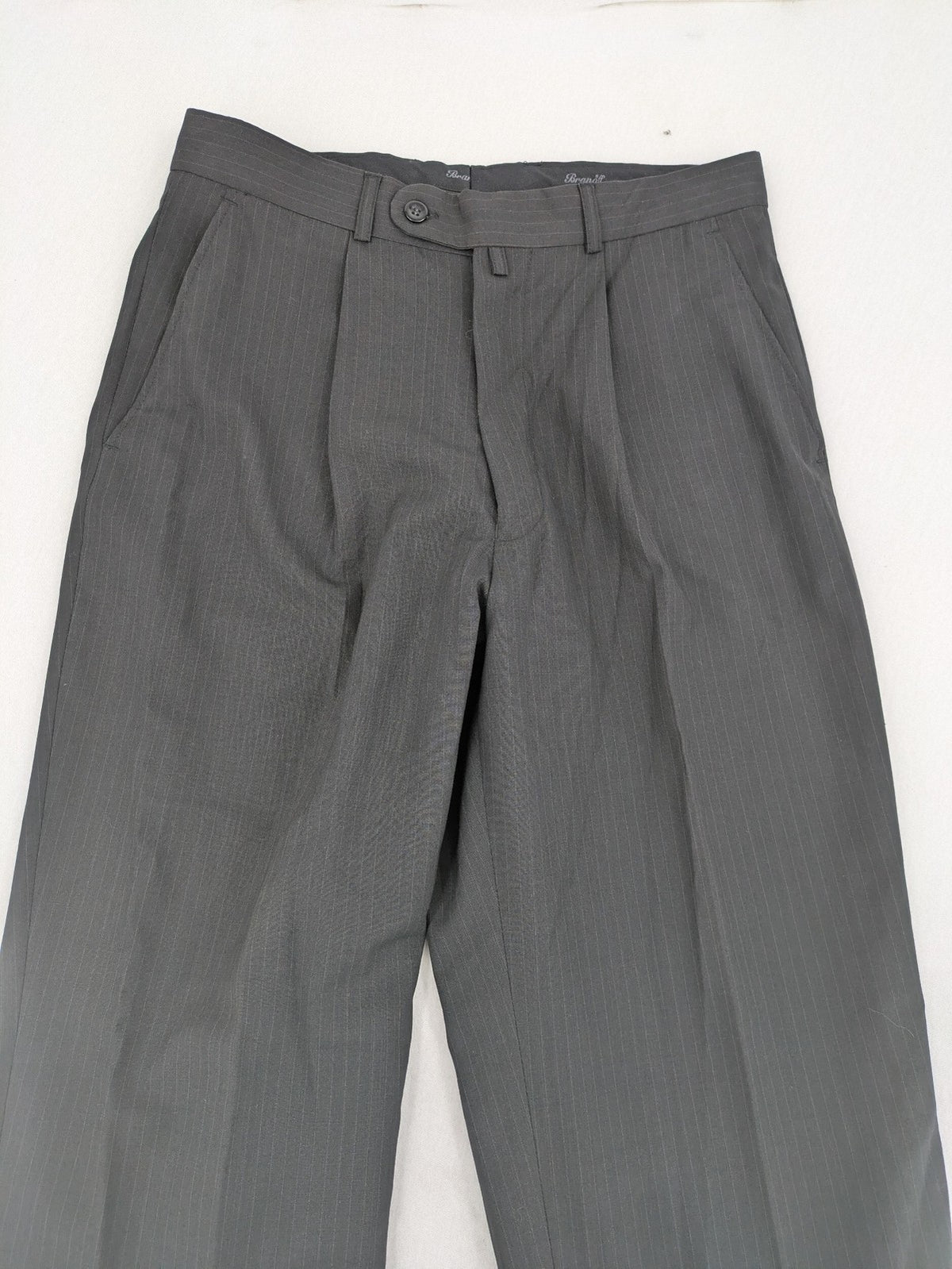 Wahl grey dress pants with pinstripe pattern and pleats, featuring side and back pockets.